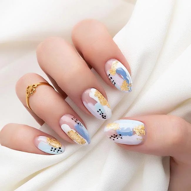 Blue and gold manicure